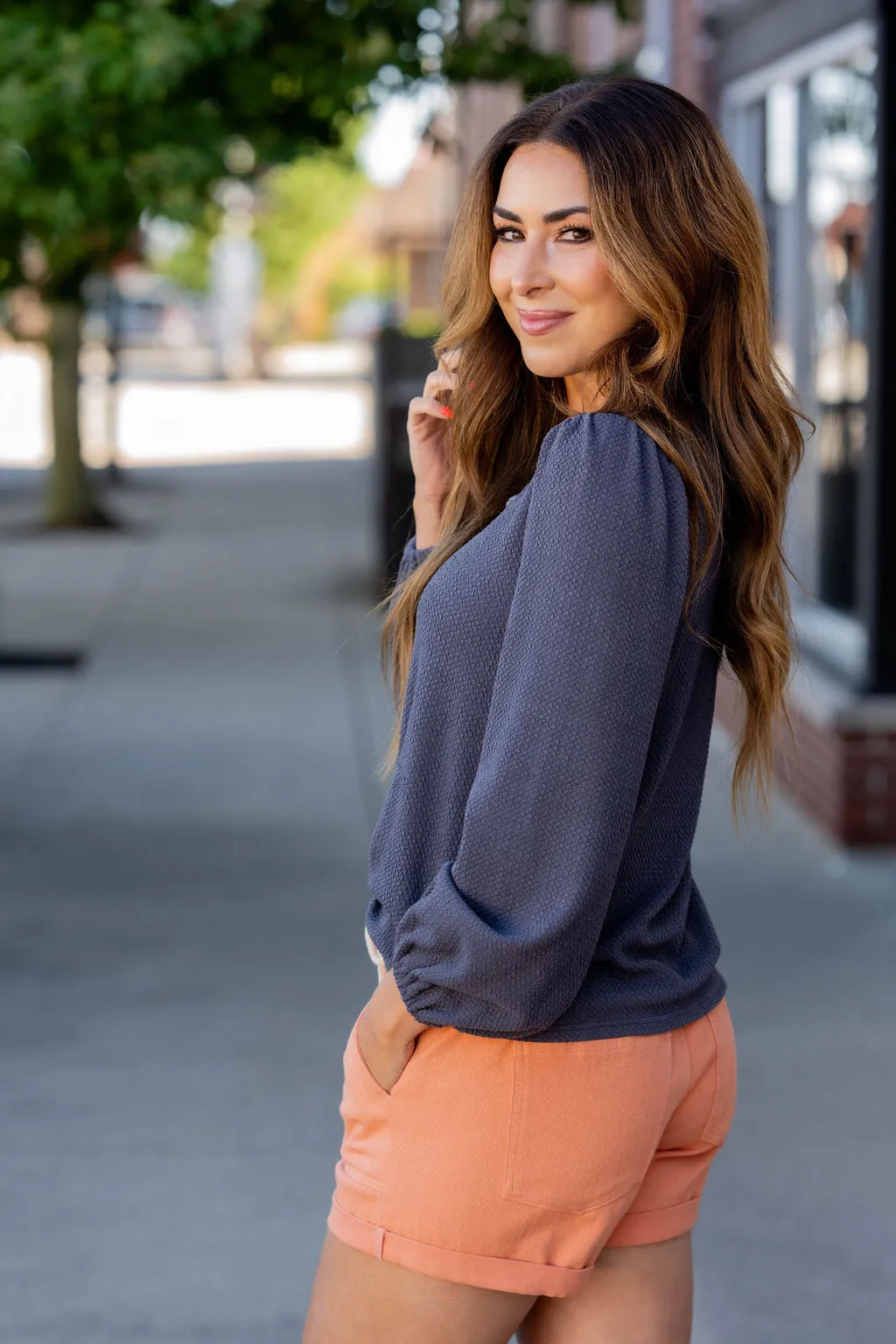 Bold Textured Cinched Sleeve Blouse